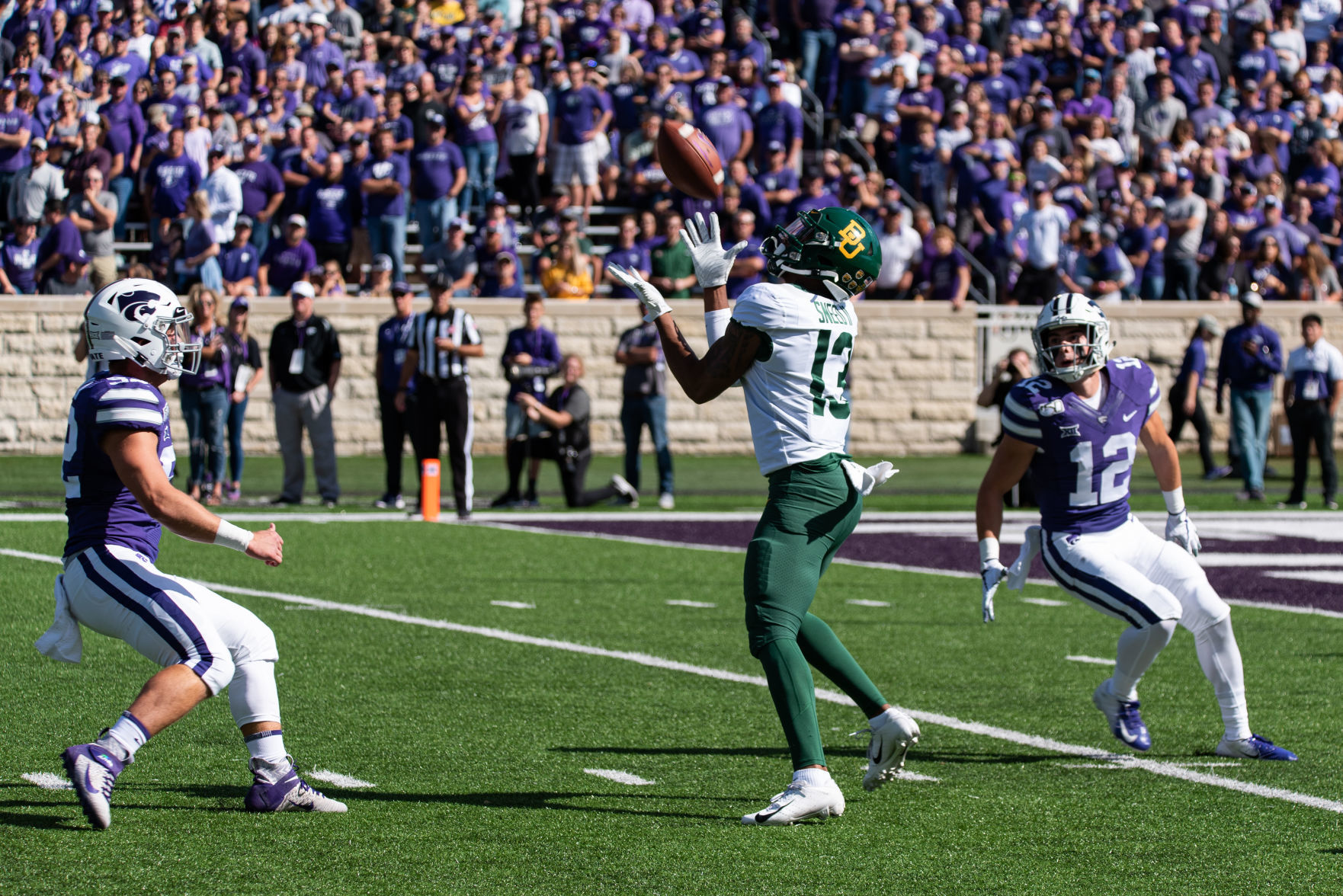 RJ Sneed receives punt from K-State's Devin Anctil